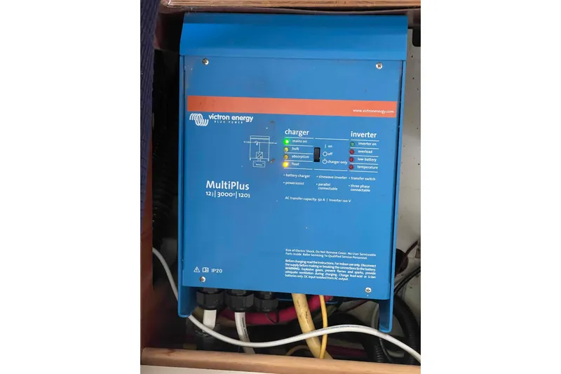 Slide: The Image of Victron Energy MultiPlus charger and inverter setup on 2010 Hunter 45 Center Cockpit sailboat. - 42