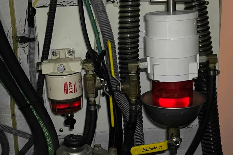 Slide: The Image of Electrical wiring and components inside a 2010 Hunter 45 Center Cockpit boat. - 62