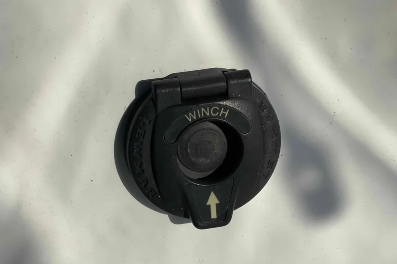 Slide: The Image of Engine compartment of a 2010 Hunter 45 Center Cockpit sailboat, featuring a Fischer Panda generator. - 70