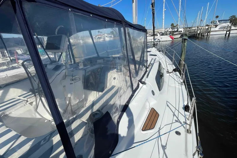 Slide: The Image of Rope clutches on 2010 Hunter 45 Center Cockpit sailboat, labeled for various halyards and inhauls. - 73