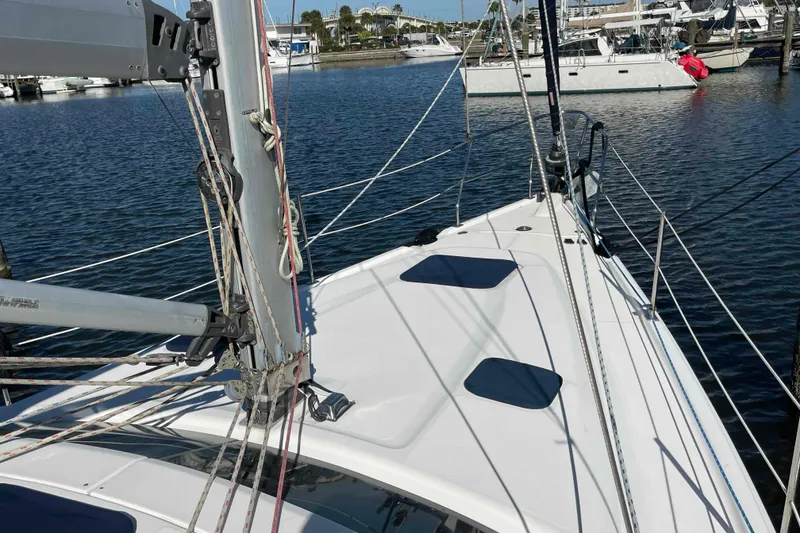 Slide: The Image of Winch and ropes on 2010 Hunter 45 Center Cockpit sailboat deck. - 74