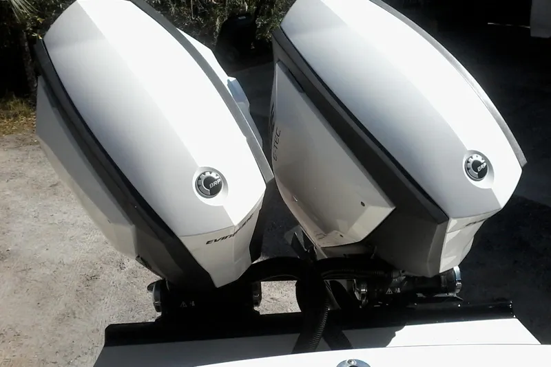 Slide: The Image of Twin outboard engines on a 2002 Albemarle 265 Express Fisherman boat. - 10