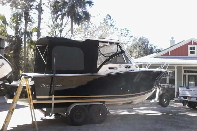 Slide: The Image of 2002 Albemarle 265 Express Fisherman boat on trailer, parked outdoors. - 3