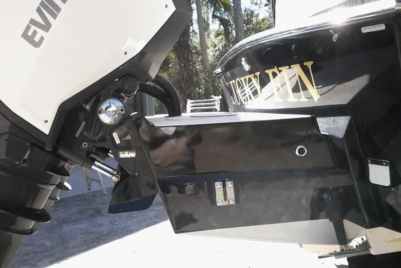 Slide: The Image of 2002 Albemarle 265 Express Fisherman boat with dual outboard motors on a trailer. - 7