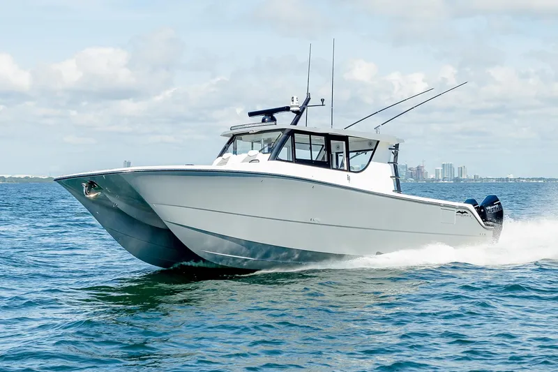 The Image of Manufacturer Provided Image: 2026 Invincible 46 Pilothouse cruising on open water, showcasing sleek design and powerful performance. - 0