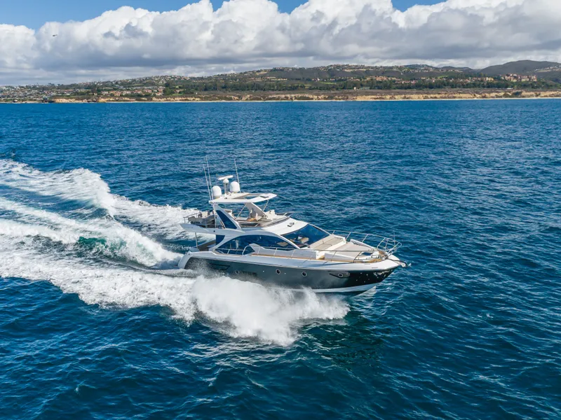 Slide: The Image of Azimut 50 Fly 2015 yacht cruising on open sea, sunny day. - 17