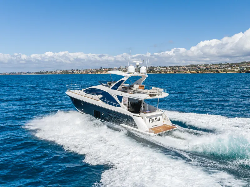 Slide: The Image of Azimut 50 Fly 2015 yacht cruising on open sea, sunny day. - 18