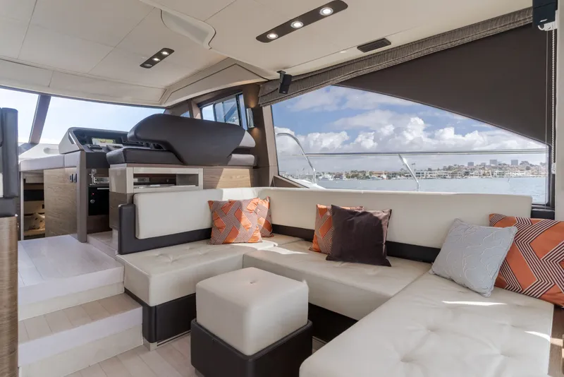 Slide: The Image of Interior of 2015 Azimut 50 Fly yacht with luxurious seating area. - 23