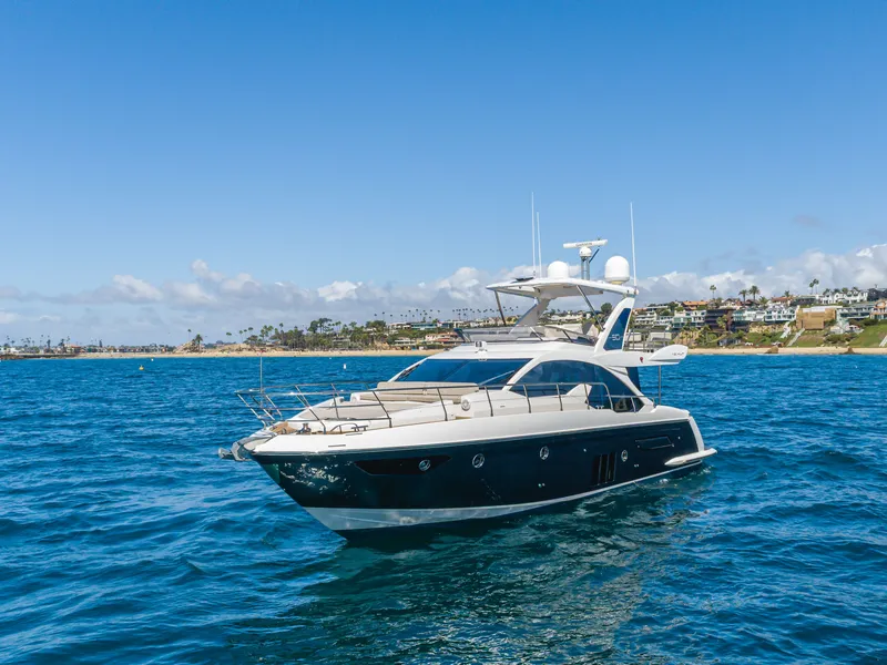 Slide: The Image of Azimut 50 Fly 2015 yacht on open sea near coastline. - 3