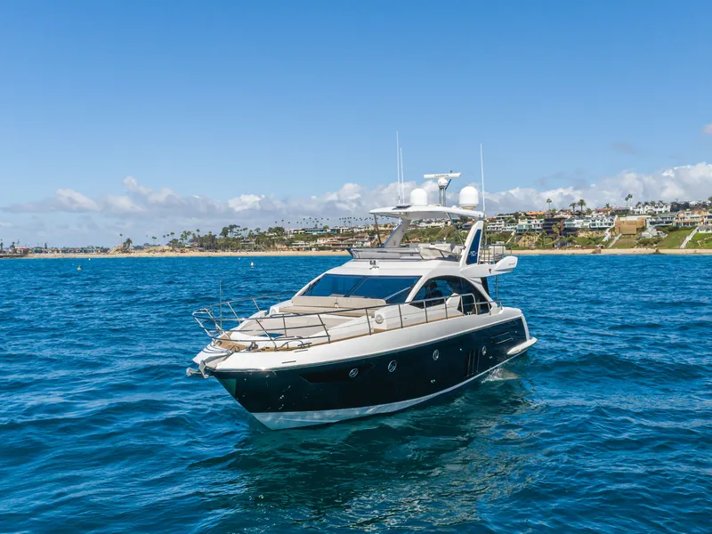 Slide: The Image of Azimut 50 Fly 2015 yacht on open sea near coastline. - 4