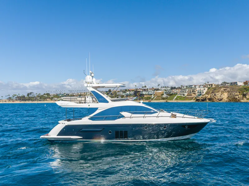 Slide: The Image of Azimut 50 Fly 2015 yacht on open sea near coastline. - 7