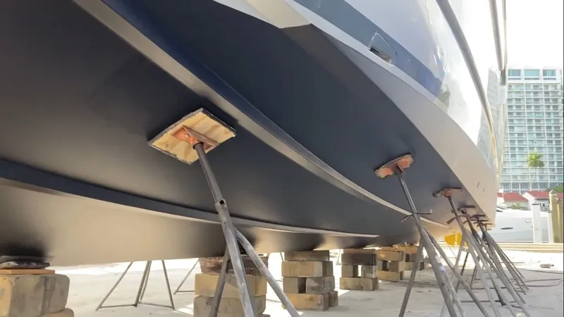 Slide: The Image of 2015 Pershing 70 yacht elevated for maintenance. - 12