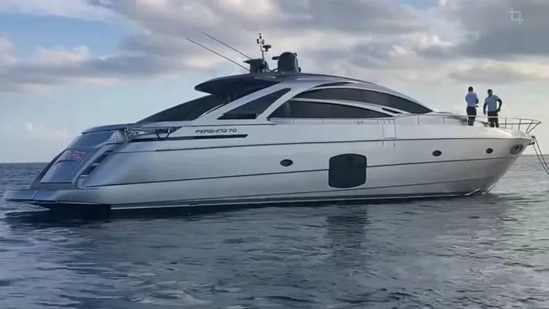 Slide: The Image of 2015 Pershing 70 luxury yacht on the sea. - 2