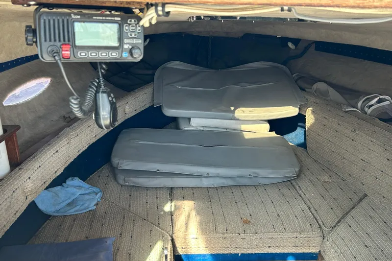 Slide: The Image of Interior cabin of a 1985 Sea Ray 255 SVR boat with radio equipment. - 2