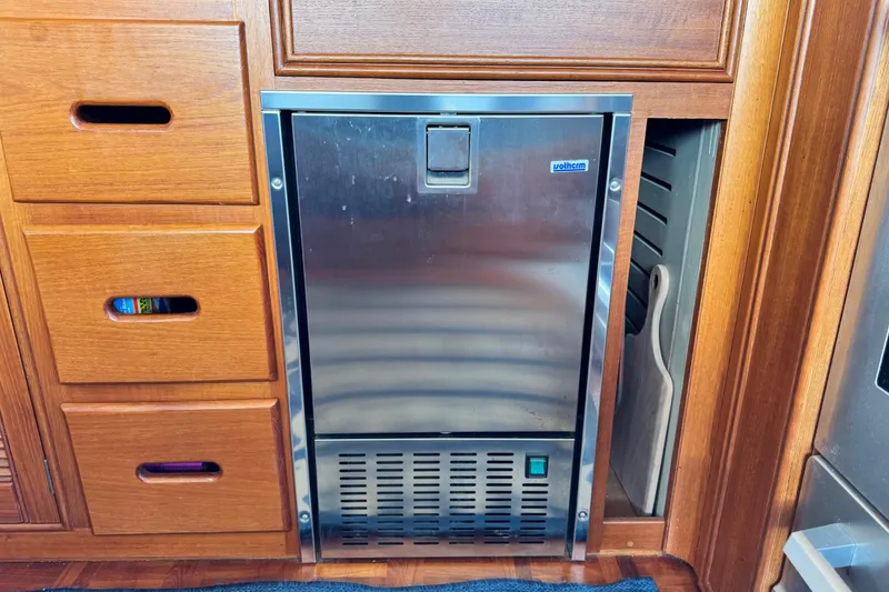 Slide: The Image of Stainless steel fridge in 2000 Grand Banks 52 Europa yacht interior. - 10
