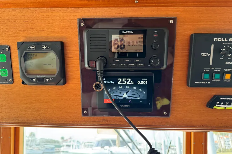 Slide: The Image of Control panel of a 2000 Grand Banks 52 Europa yacht with navigation instruments. - 14