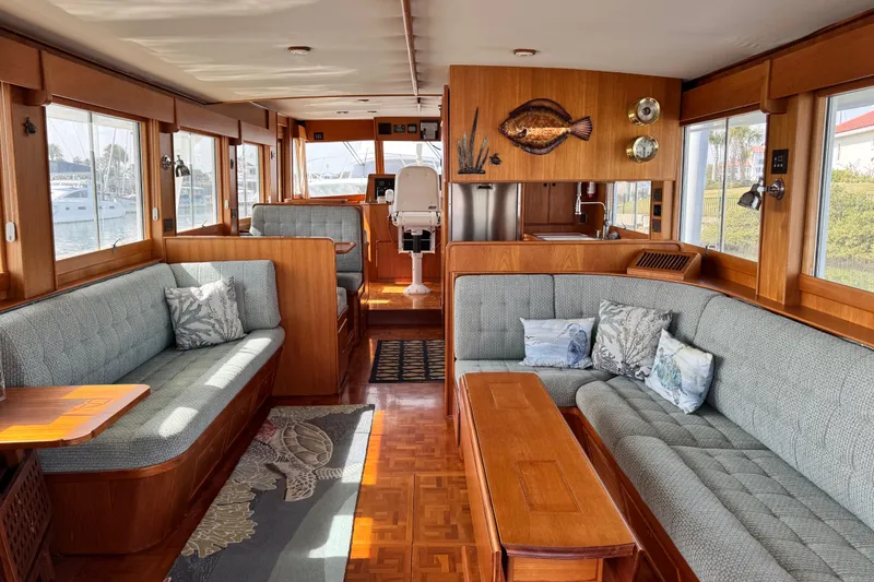 Slide: The Image of Luxurious interior of 2000 Grand Banks 52 Europa yacht with elegant wood finishes. - 2