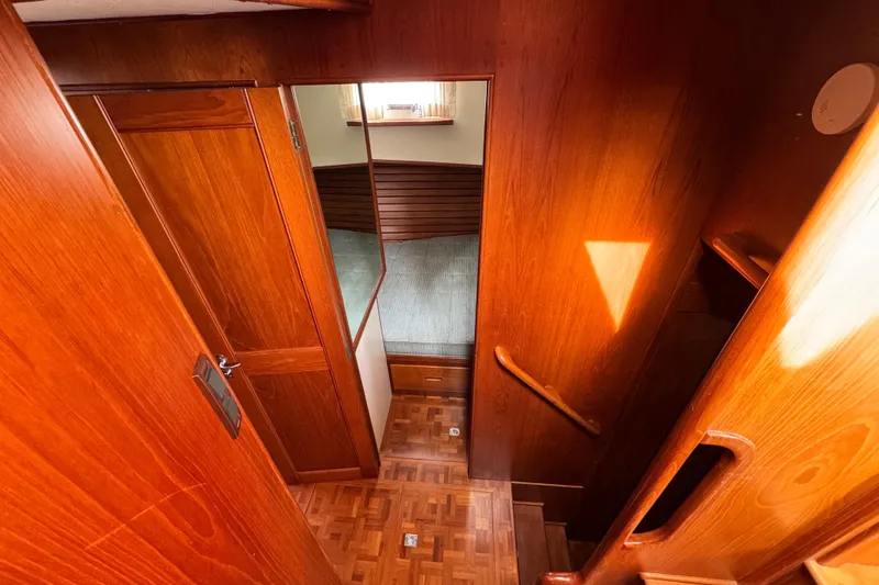 Slide: The Image of Interior of 2000 Grand Banks 52 Europa yacht with wooden finishes and cozy cabin. - 22