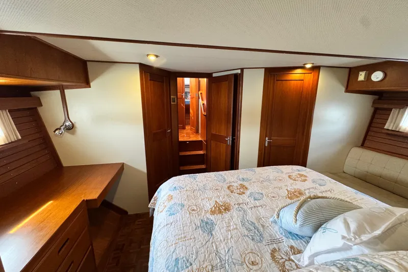 Slide: The Image of Luxurious cabin interior of 2000 Grand Banks 52 Europa yacht with elegant wood finish. - 26