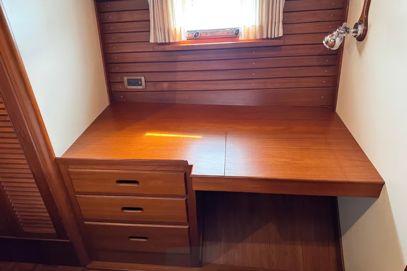 Slide: The Image of Wooden desk with drawers in 2000 Grand Banks 52 Europa yacht interior. - 31