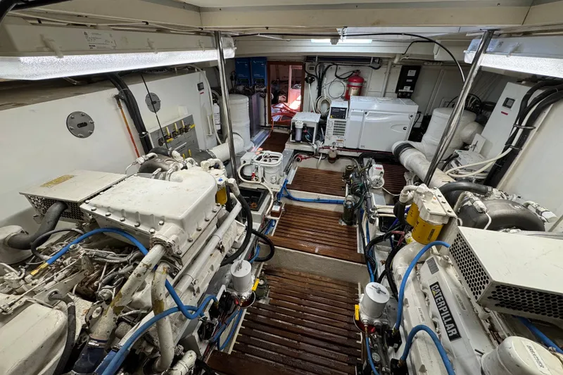 Slide: The Image of Engine room of 2000 Grand Banks 52 Europa yacht with Caterpillar engines. - 46
