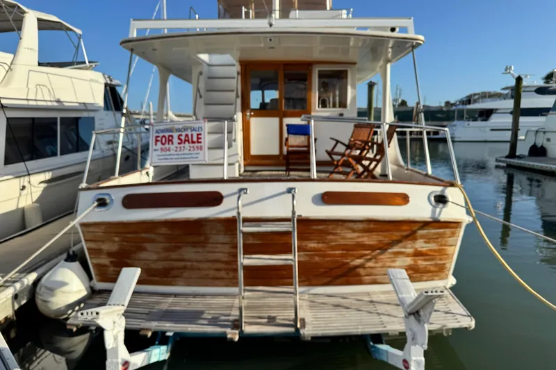 Slide: The Image of Grand Banks 52 Europa yacht from 2000 for sale at marina dock. - 49