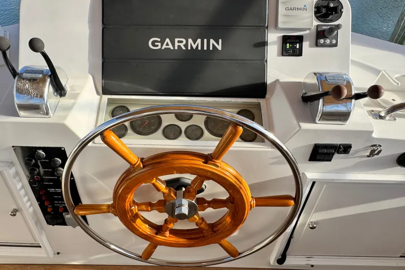 Slide: The Image of Helm of 2000 Grand Banks 52 Europa with Garmin navigation system. - 60