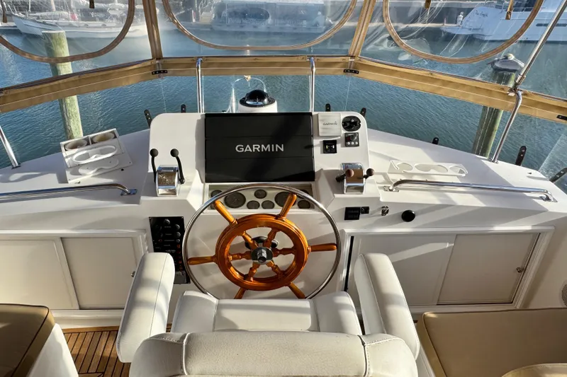 Slide: The Image of Helm of 2000 Grand Banks 52 Europa yacht with Garmin navigation system. - 61