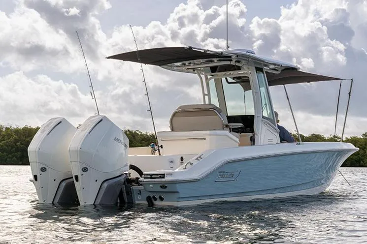 Slide: The Image of Manufacturer Provided Image: 2023 Boston Whaler 280 Dauntless boat with twin engines on the water. - 4
