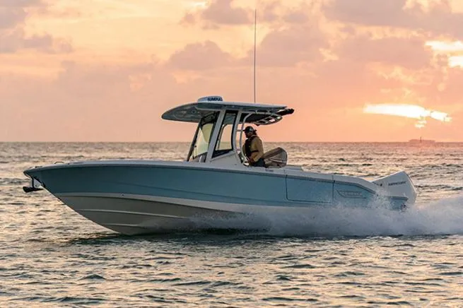 Slide: The Image of Manufacturer Provided Image: 2023 Boston Whaler 280 Dauntless boat cruising at sunset. - 5