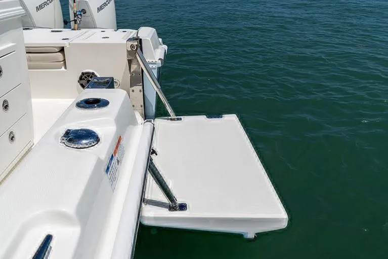 Slide: The Image of Manufacturer Provided Image: 2023 Boston Whaler 280 Dauntless swim platform on calm water. - 6