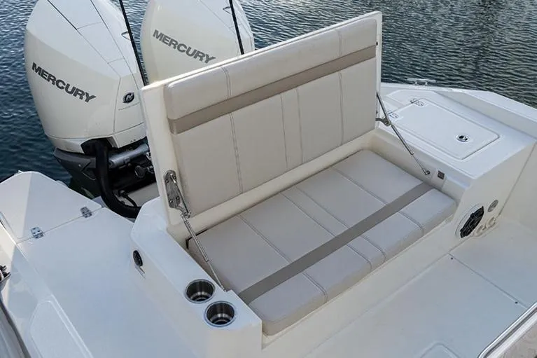 Slide: The Image of Manufacturer Provided Image: 2023 Boston Whaler 280 Dauntless boat with Mercury engines and comfortable seating. - 9