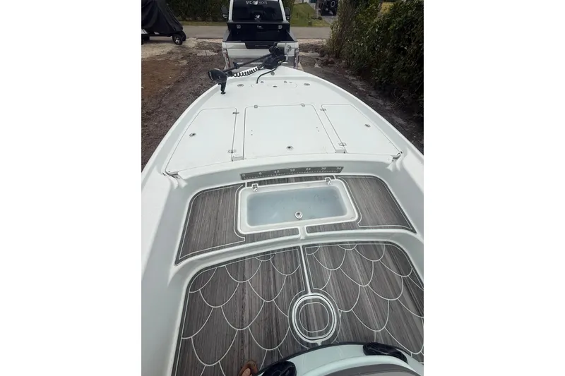 Slide: The Image of 2020 Yellowfin 24 Bay CE boat deck with sleek design and modern features. - 2