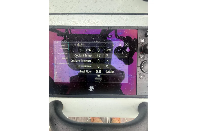 Slide: The Image of Dashboard of 2020 Yellowfin 24 Bay CE boat showing engine metrics. - 7