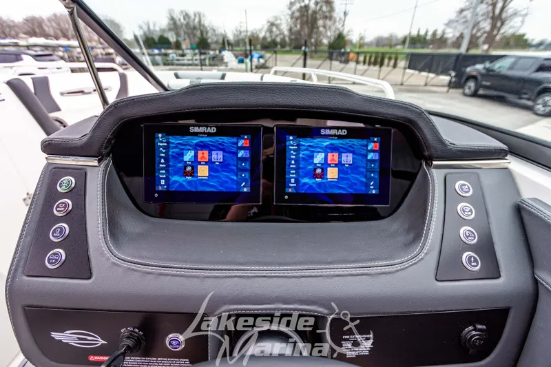 Slide: The Image of Dashboard of 2026 Chaparral SSX 4 boat with dual Simrad displays. - 11
