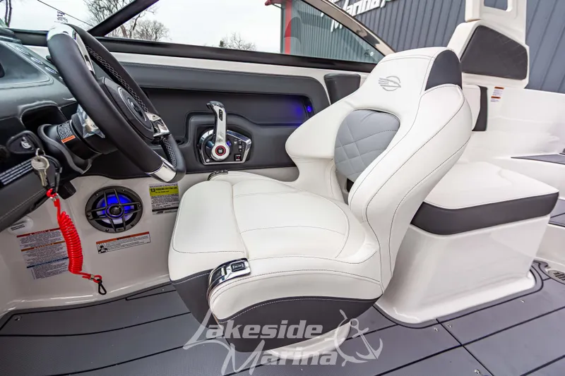 Slide: The Image of 2026 Chaparral SSX 4 boat interior with luxury seating and modern controls. - 14