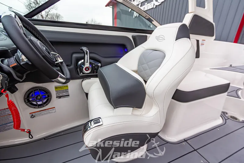Slide: The Image of Interior of 2026 Chaparral SSX 4 boat, featuring luxury seating and modern controls. - 15