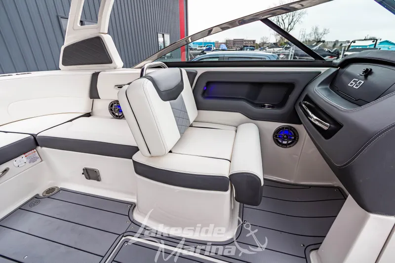 Slide: The Image of 2026 Chaparral SSX 4 boat interior with modern seating and dashboard design. - 19