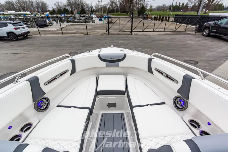 Slide: The Image of 2026 Chaparral SSX 4 boat interior with white seating and modern design. - 25