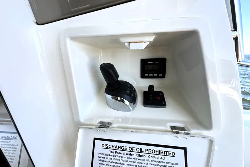 Slide: The Image of Control panel of a 2016 Prestige 500S yacht with joystick and display. - 13