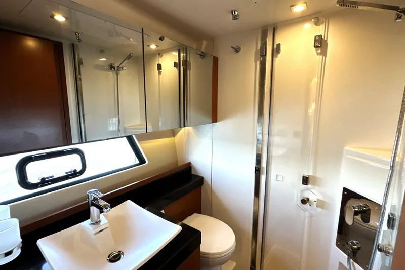 Slide: The Image of Luxurious bathroom in 2016 Prestige 500S yacht with modern fixtures and elegant design. - 36