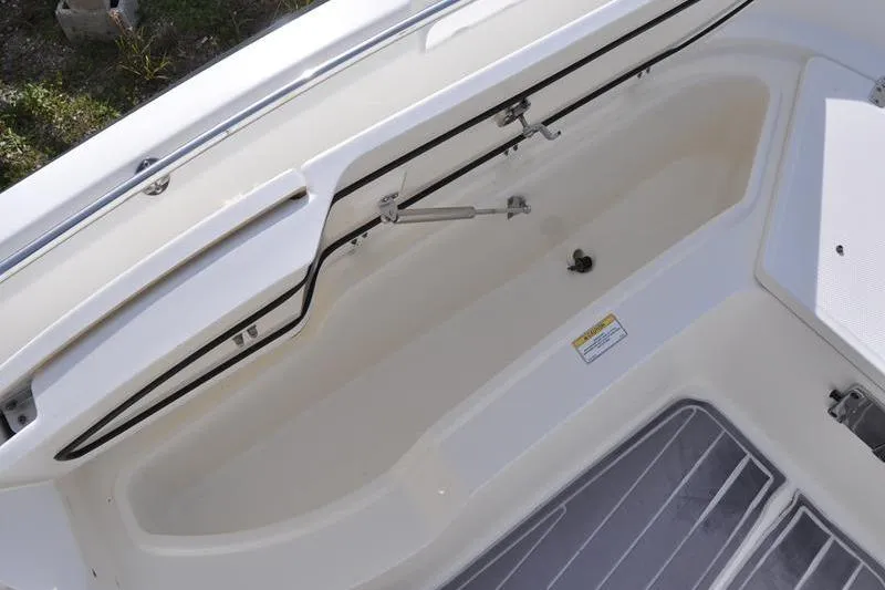 Slide: The Image of 2016 Boston Whaler 270 Dauntless interior storage compartment detail. - 30