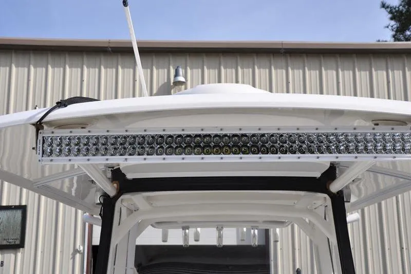 Slide: The Image of 2016 Boston Whaler 270 Dauntless T-top with LED light bar, exterior view. - 36