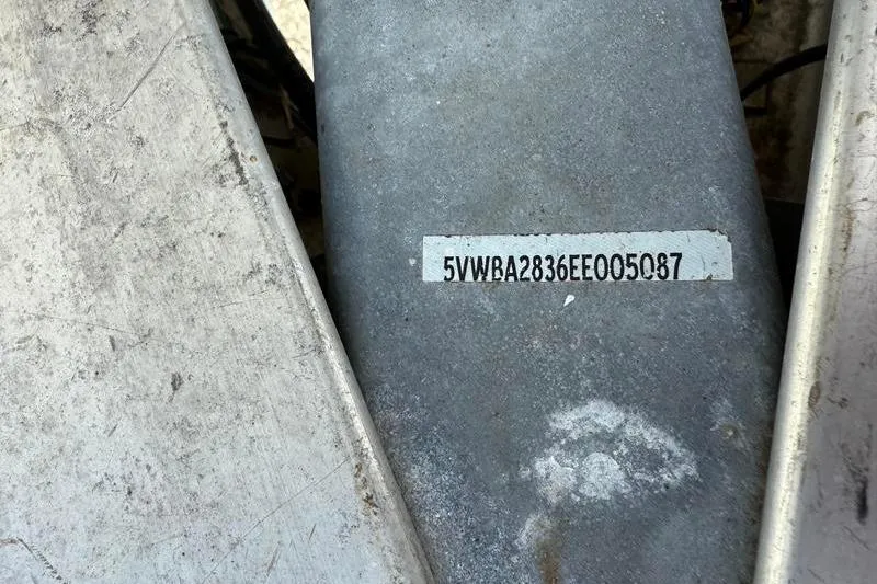 Slide: The Image of Close-up of a 2016 Boston Whaler 270 Dauntless with visible serial number. - 43