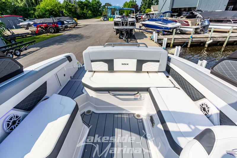 Slide: The Image of 2026 Chaparral SSX 6 boat interior at Lakeside Marina, featuring sleek seating and modern design. - 13