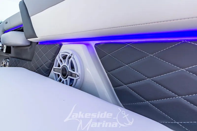 Slide: The Image of Interior of 2026 Chaparral SSX 6 boat with speaker and blue LED lighting. - 16