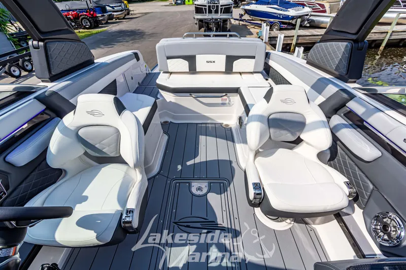 Slide: The Image of 2026 Chaparral SSX 6 boat interior with luxurious seating at Lakeside Marina. - 25