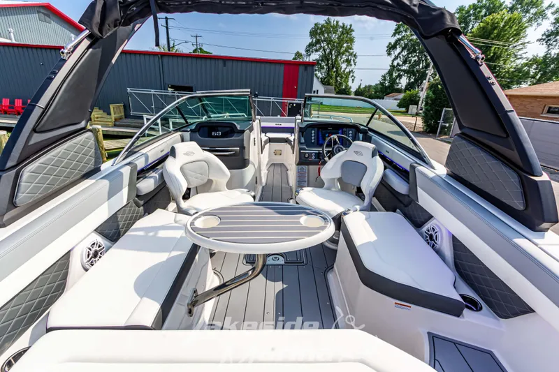 Slide: The Image of 2026 Chaparral SSX 6 boat interior with luxurious seating and modern dashboard. - 27