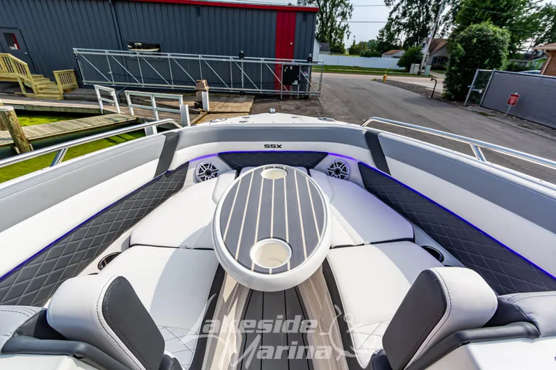 Slide: The Image of 2026 Chaparral SSX 6 boat interior with sleek seating and modern design. - 31