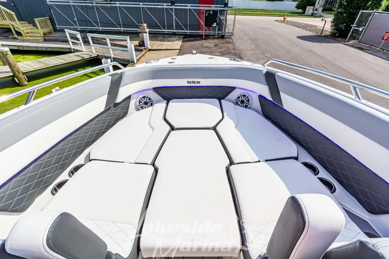 Slide: The Image of 2026 Chaparral SSX 6 boat interior with luxurious seating and modern design. - 32